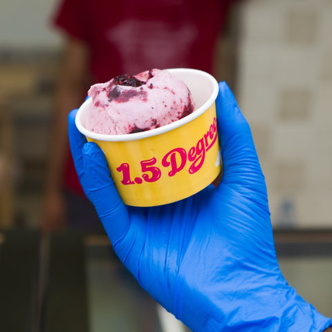 A scoop of 1.5 Degree plant-based gelato in our yellow cup